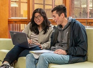Students Studying on Couch