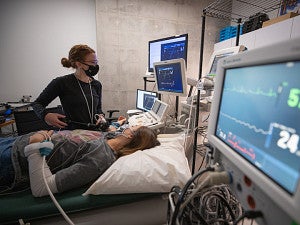 student monitoring other student's vitals