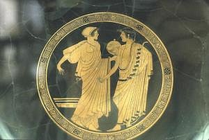 man and woman robed figures in 2d stone art
