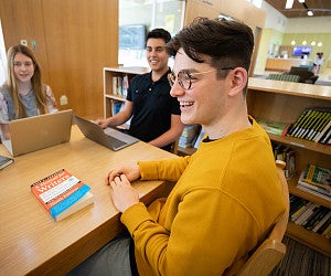 Students sitting around desk