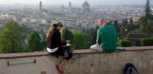 Siena, Italy (two students sketching/writing at sunset)