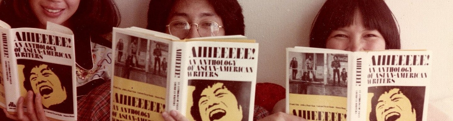 people reading book on asian-american literature