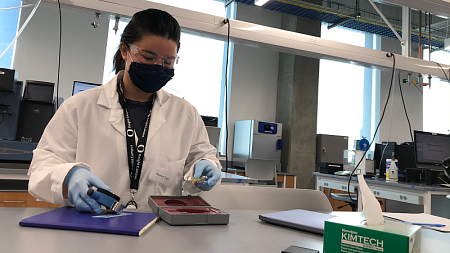 A Knight Campus Graduate Internship Program student gains hands-on experience in polymer characterization techniques. The program provides access to over $500,000 in polymer-specific capital equipment.