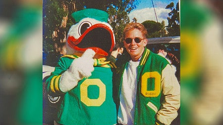 Cassandra Law, BS ’88 (human development and performance), pictured in her Oregon jacket with the Duck.