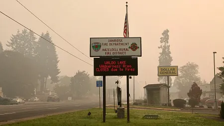 road signs in downtown Oakridge amid heavy wildfire smoke