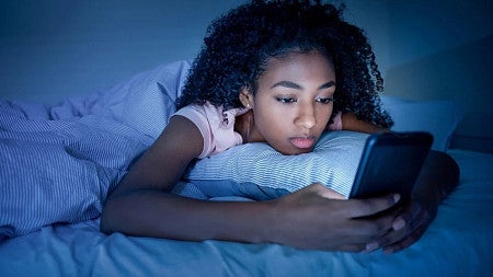 girl texting at night