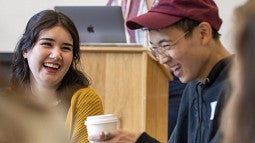 two students laughing