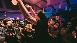 A group of students partying and jumping