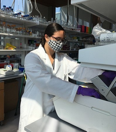 Sanjana Basak working in a lab