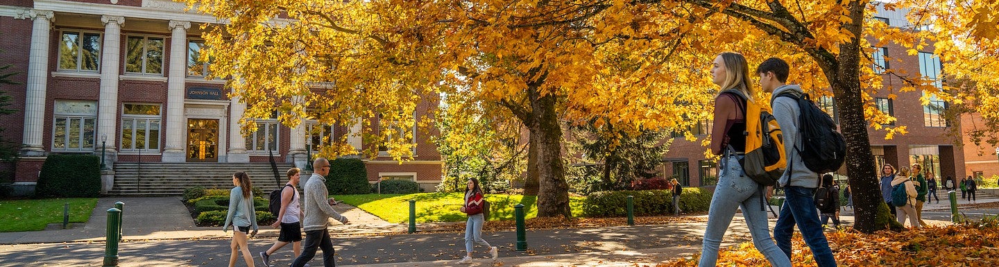 Students on campus outside in the Fall