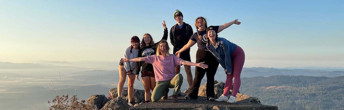 Students on top of Spencer Butt in Eugene, OR