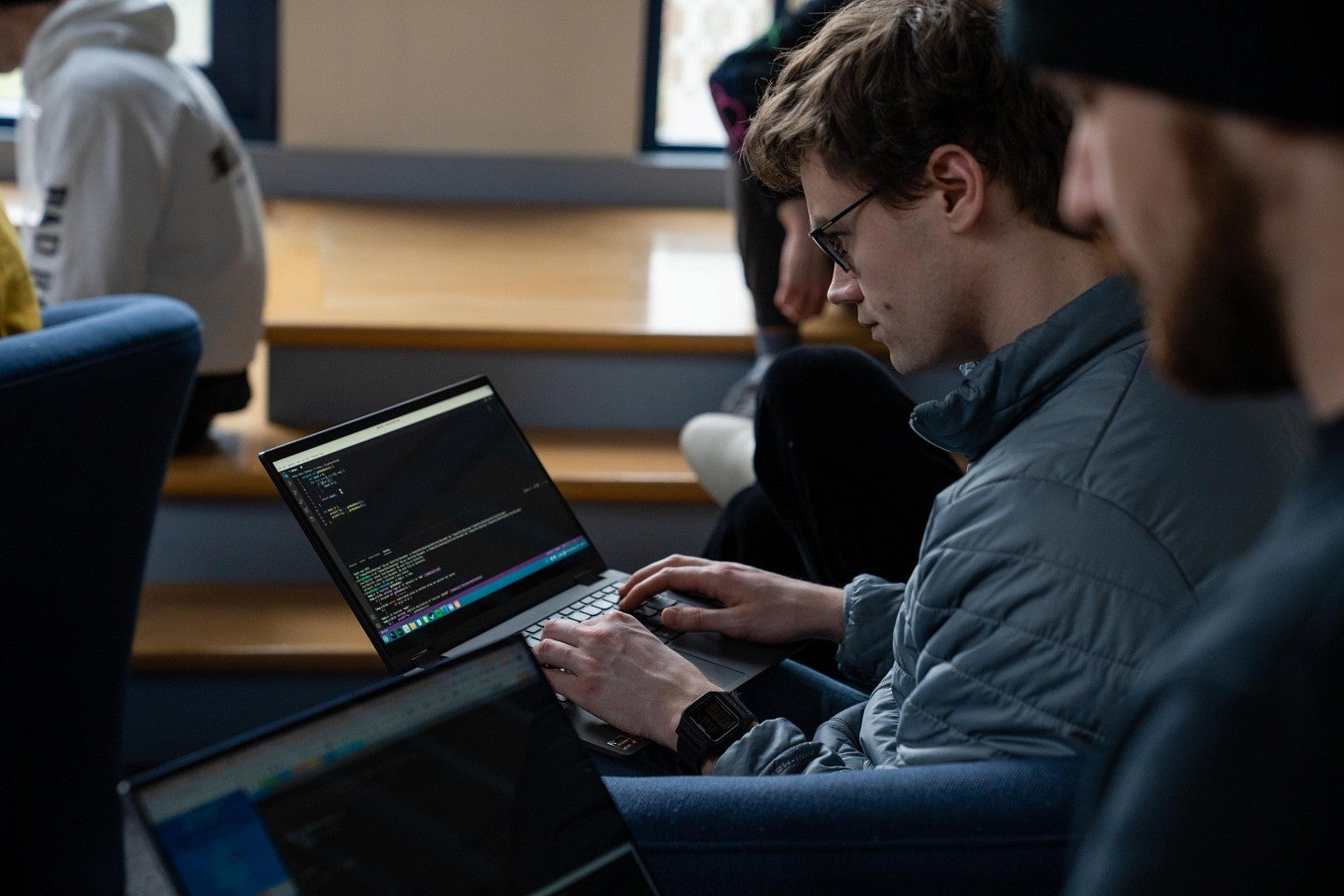 a man types on a computer