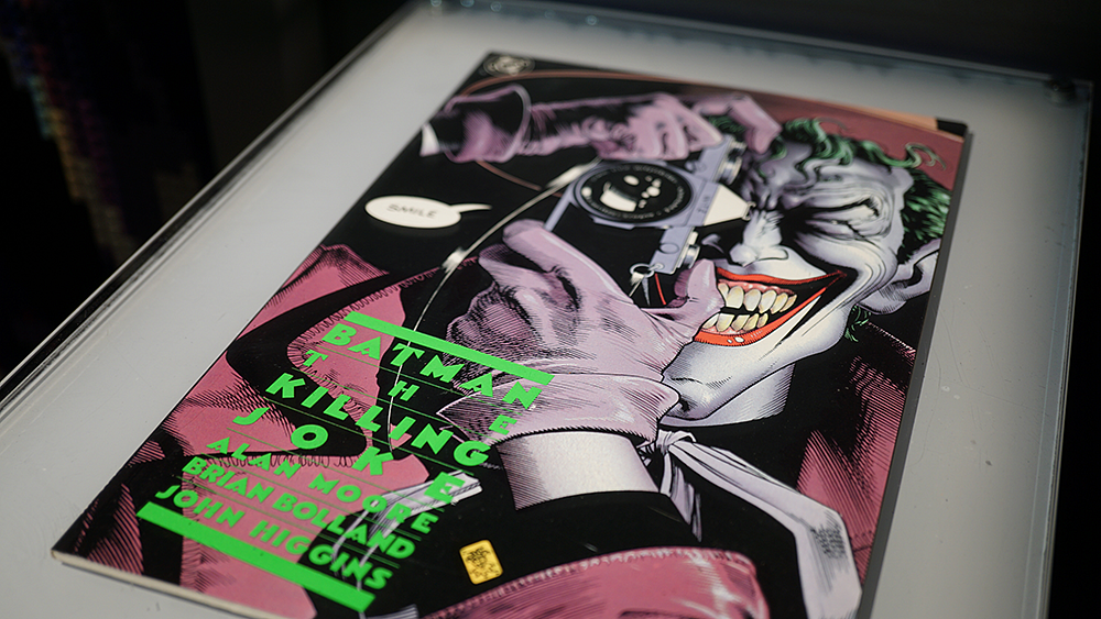 Comic book cover with the Joker character