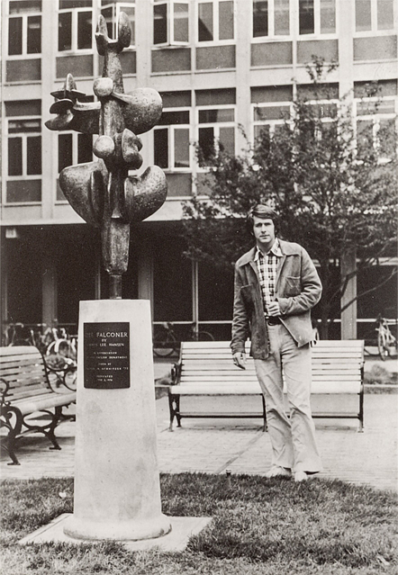 Jordan Schnitzer standing next to “The Falconer” statue in 1973