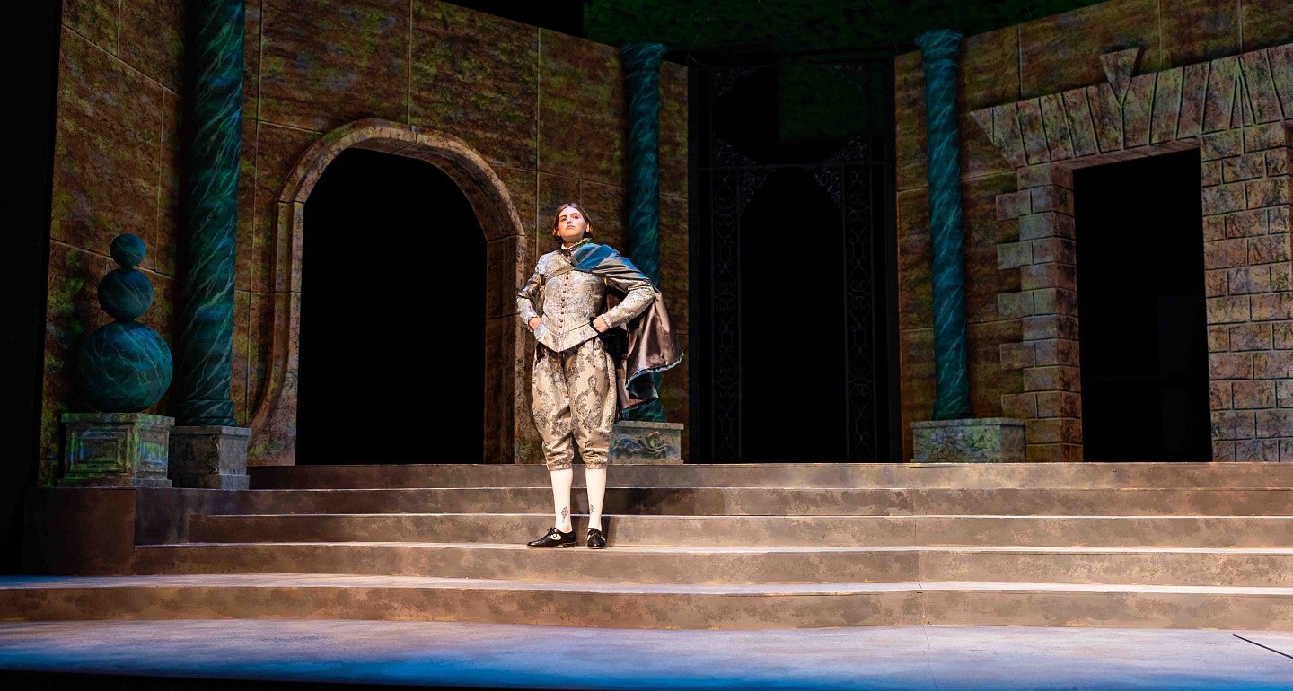 a person stands on stage