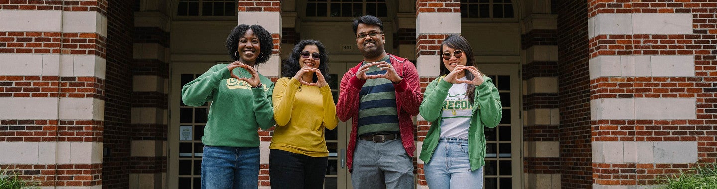 a group of international students hold the o 