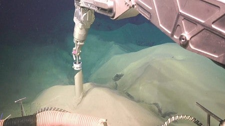 Remotely operated submarine collecting ash samples