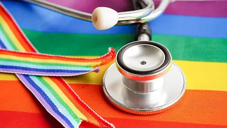 a stethoscope on an LGBTQ flag