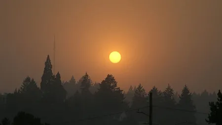 wildfire smoke obscures the sun