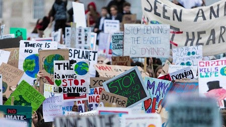 protest signs on climate change