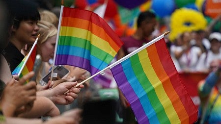 rainbow flags at a parade