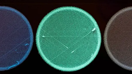 A close-up of a scaffold made with nanohoops, glowing blue under UV light