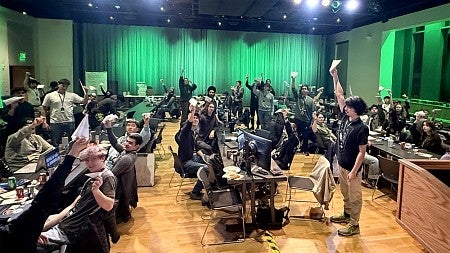 Group of students participating in a hackathon