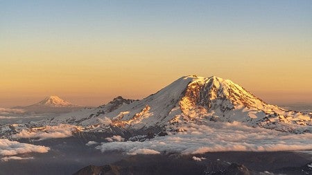 a mountain in the sunset