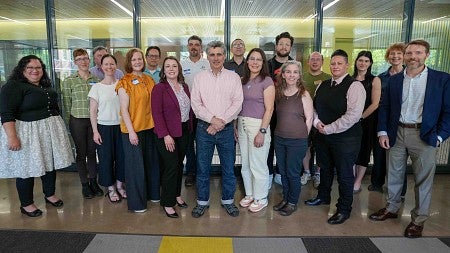 a group of receipients of the CAS awards