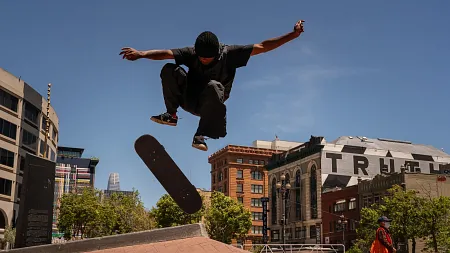 a skateboarder does a flip move