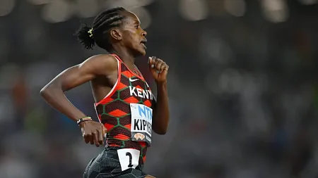 a person runs on a track