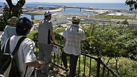 people standing by a body of water