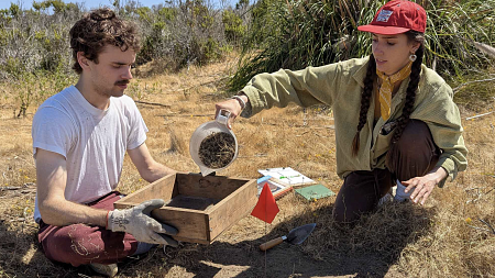 two people in the field