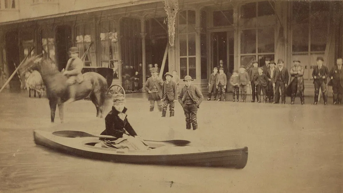 a woman in a canoe