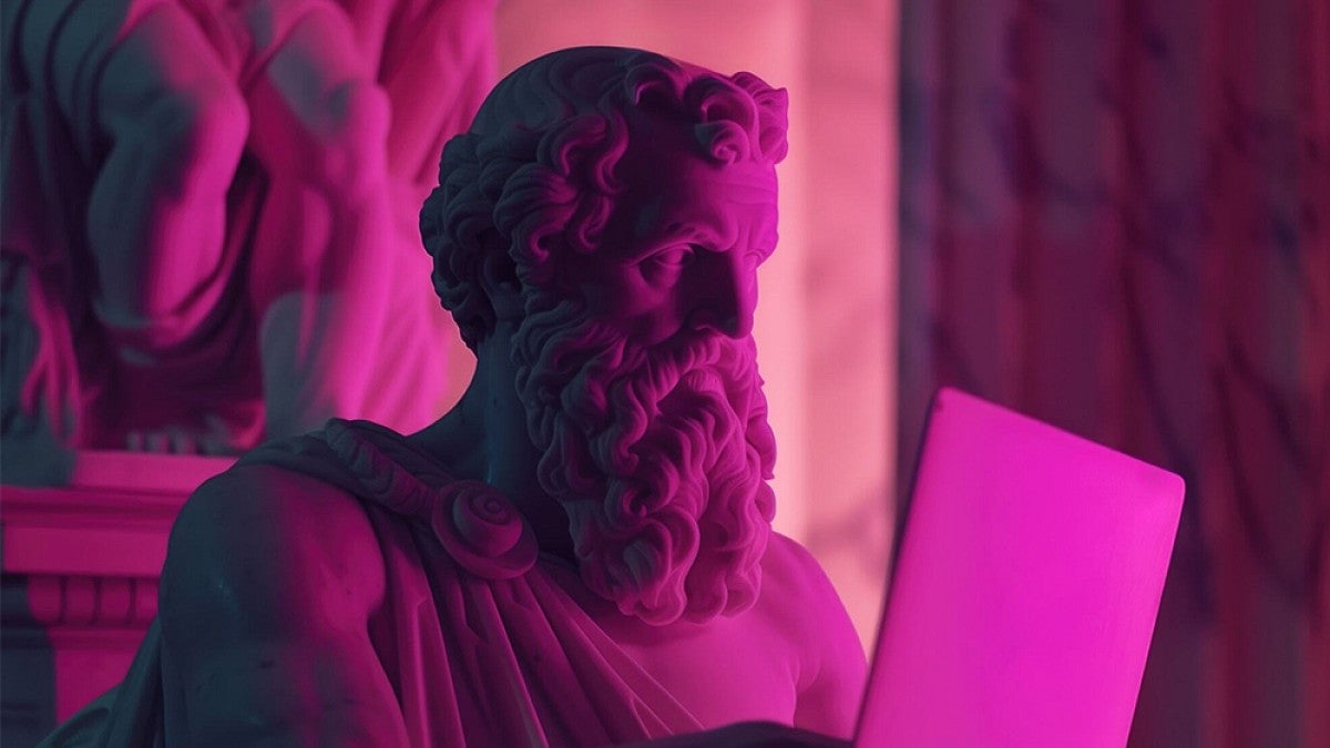 Statue of Socrates illuminated with pink light