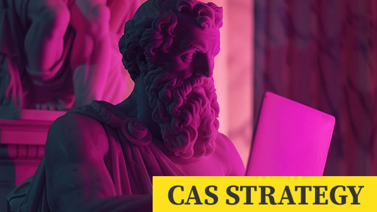 Statue of Socrates illuminated with pink light