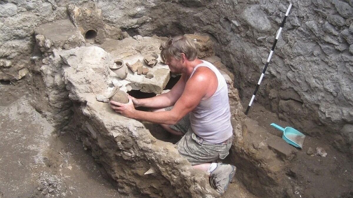 Professor Kevin Dicus excavating an ancient site