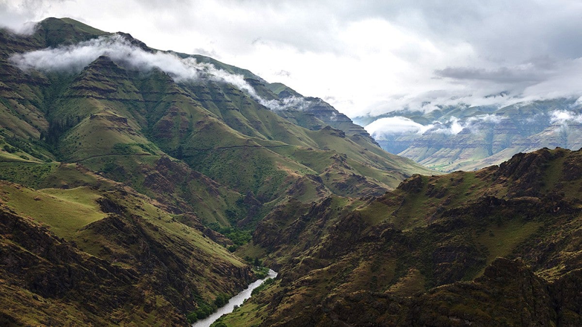 Mountain range with a river cutting through the valley