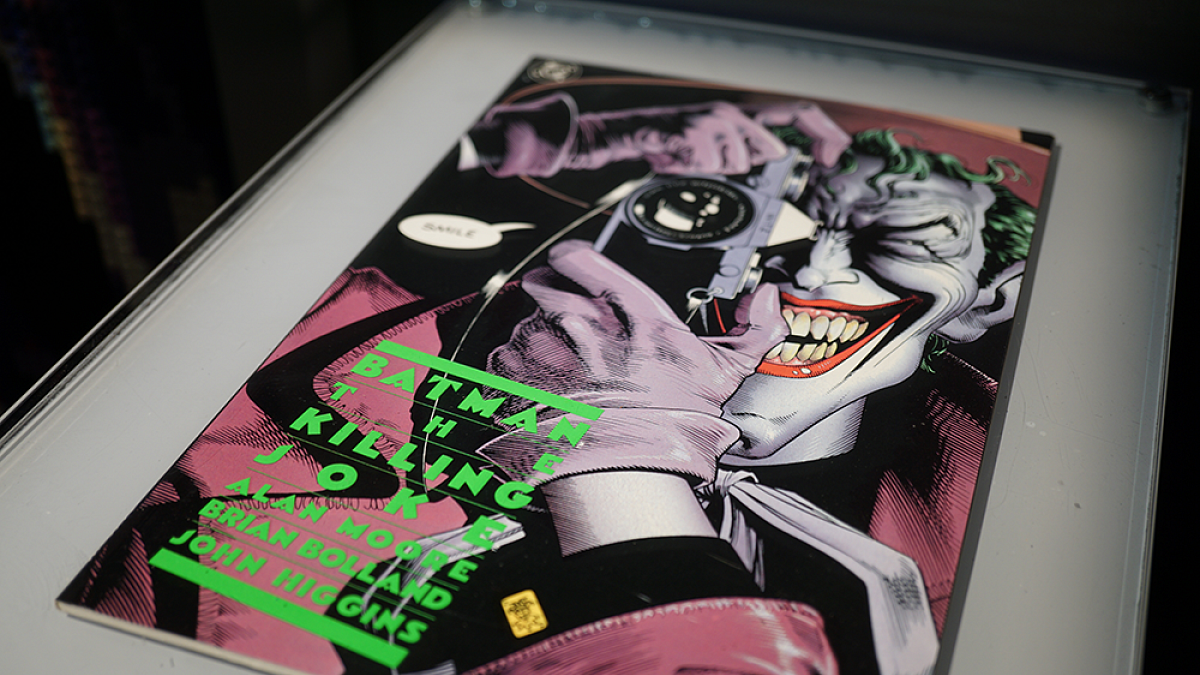 Comic book cover with the Joker character