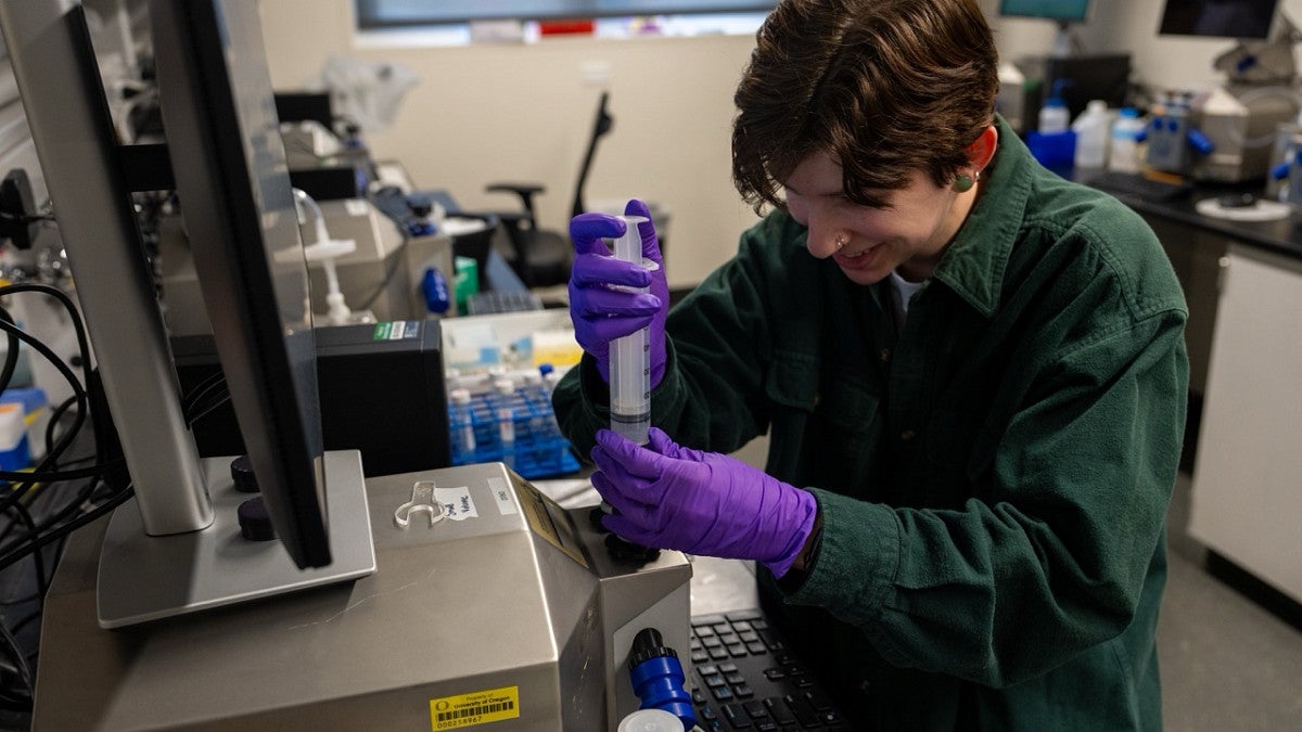 a person in a lab using equipment