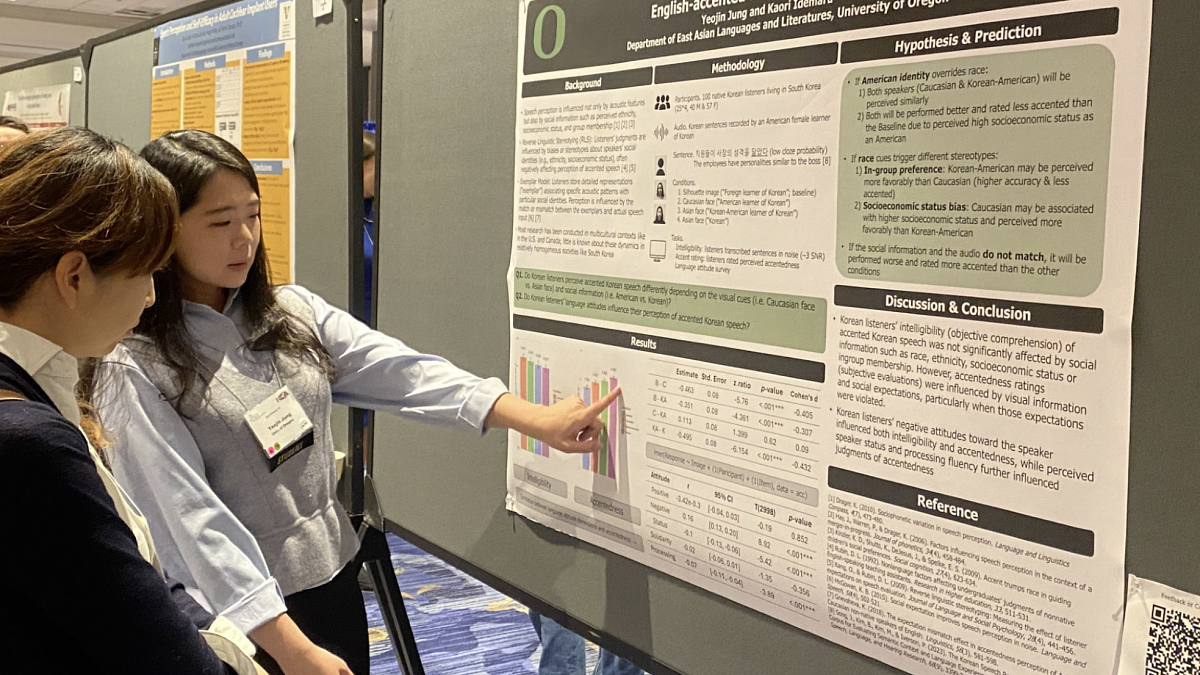 a person point to a research poster