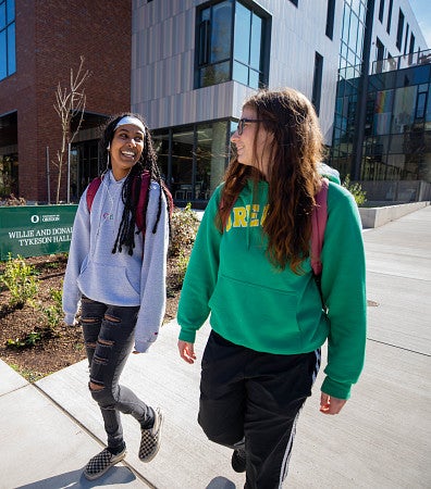 two students walking outside