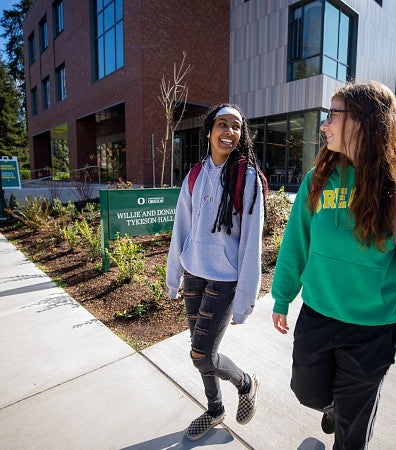 two students walking outside