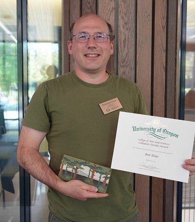 Man holding an award