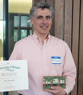 Man holding an award