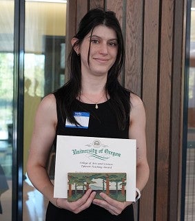 Woman holding an award