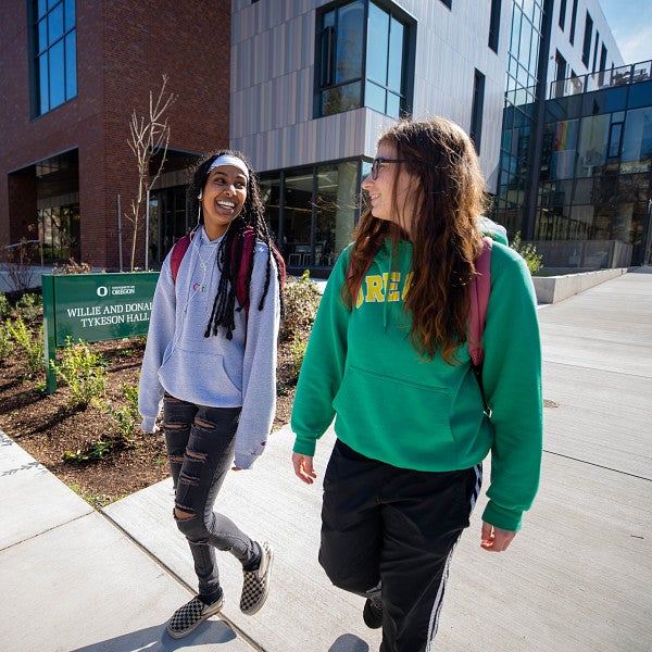 two students walking outside