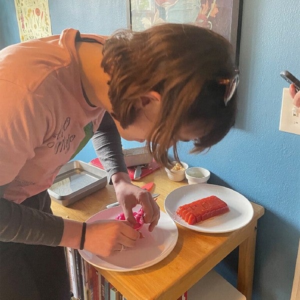 Allia Service tries out a recipe for jellied tomato salad as part of her capstone research project.