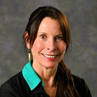 a headshot of Cheryl Armstrong